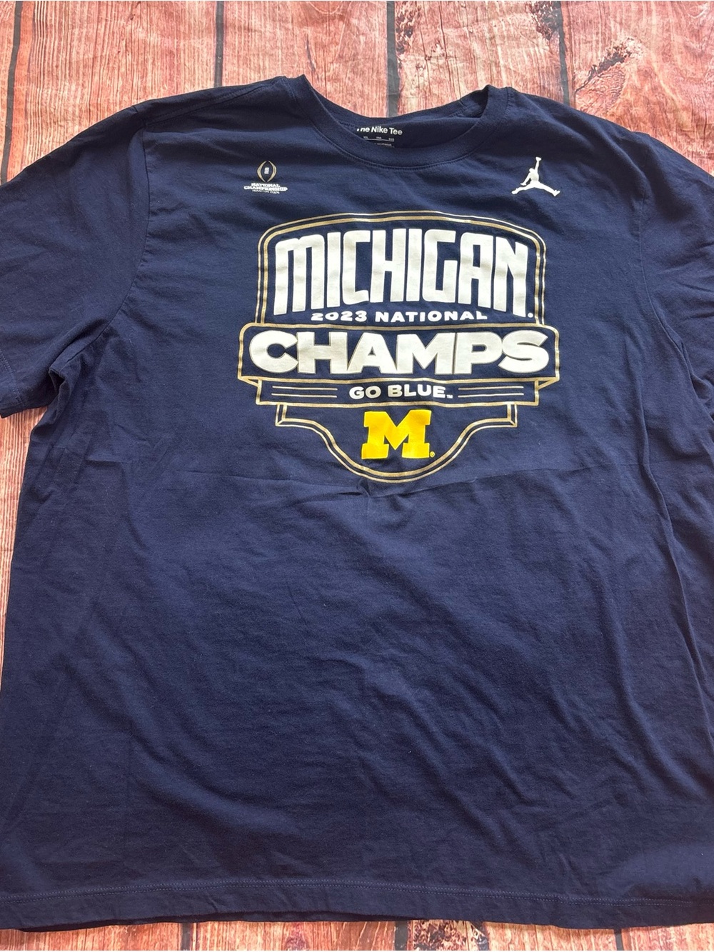 Nike Navy Michigan 2023 Champs Graphic Tee